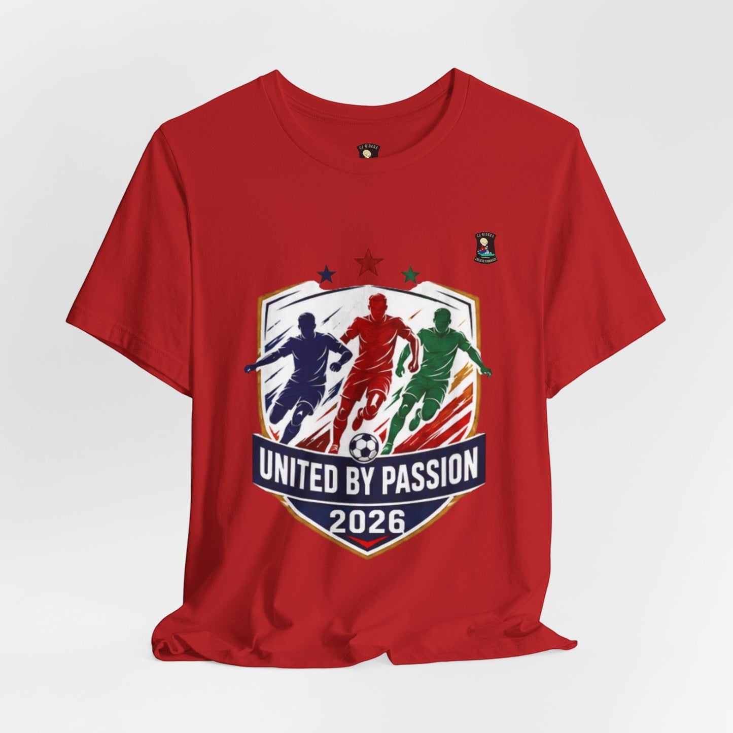 CJ Riders Foundation Store red cotton t-shirt with "United by Passion 2026" soccer graphic featuring 3 footballers.