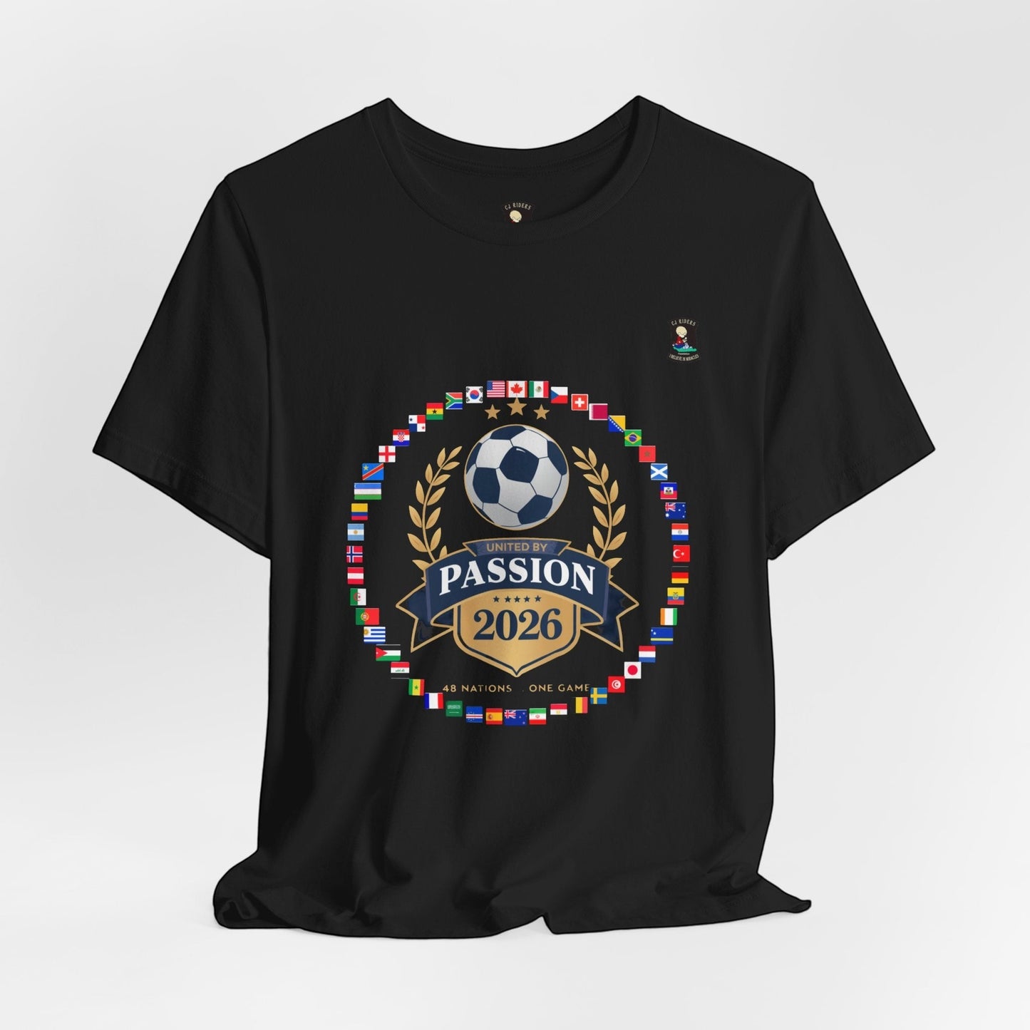CJ Riders Foundation Store black 100% cotton t-shirt with 2026 World Cup graphic featuring flags, soccer ball, and "United by Passion" text.