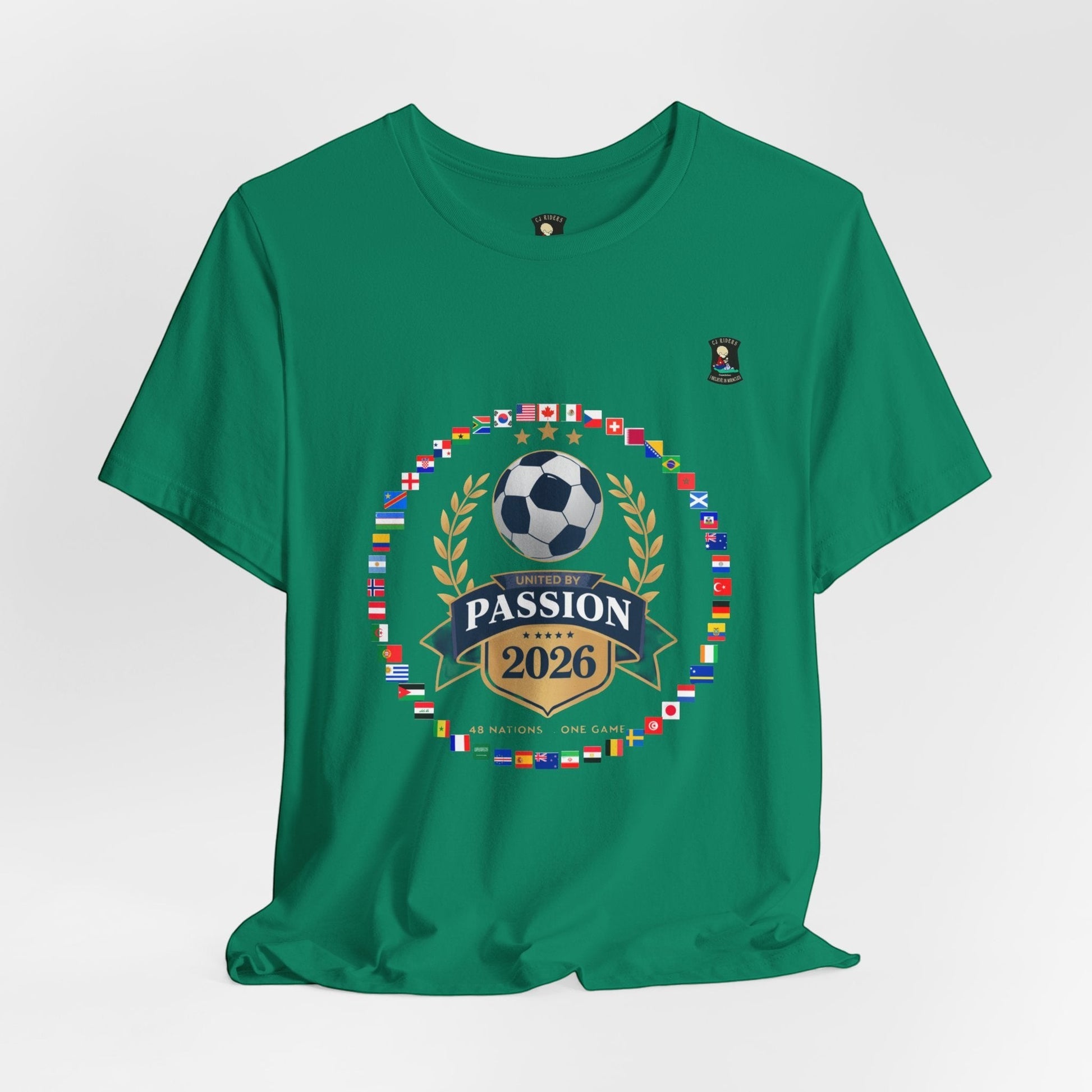 CJ Riders Foundation Store green 100% cotton t-shirt with 2026 World Cup graphic featuring flags, soccer ball, and "United by Passion" text.