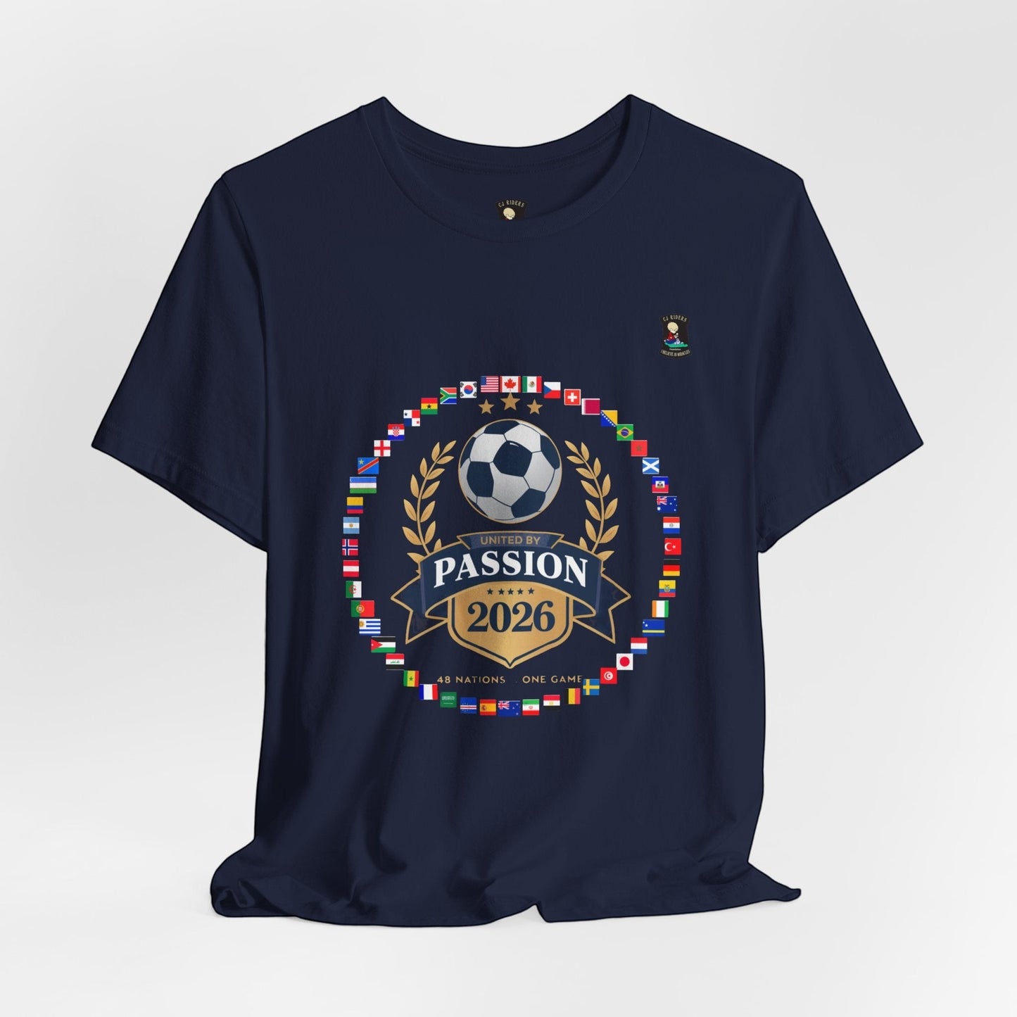 CJ Riders Foundation Store navy blue 100% cotton t-shirt with 2026 World Cup graphic featuring a soccer ball, laurel wreath, and flags.