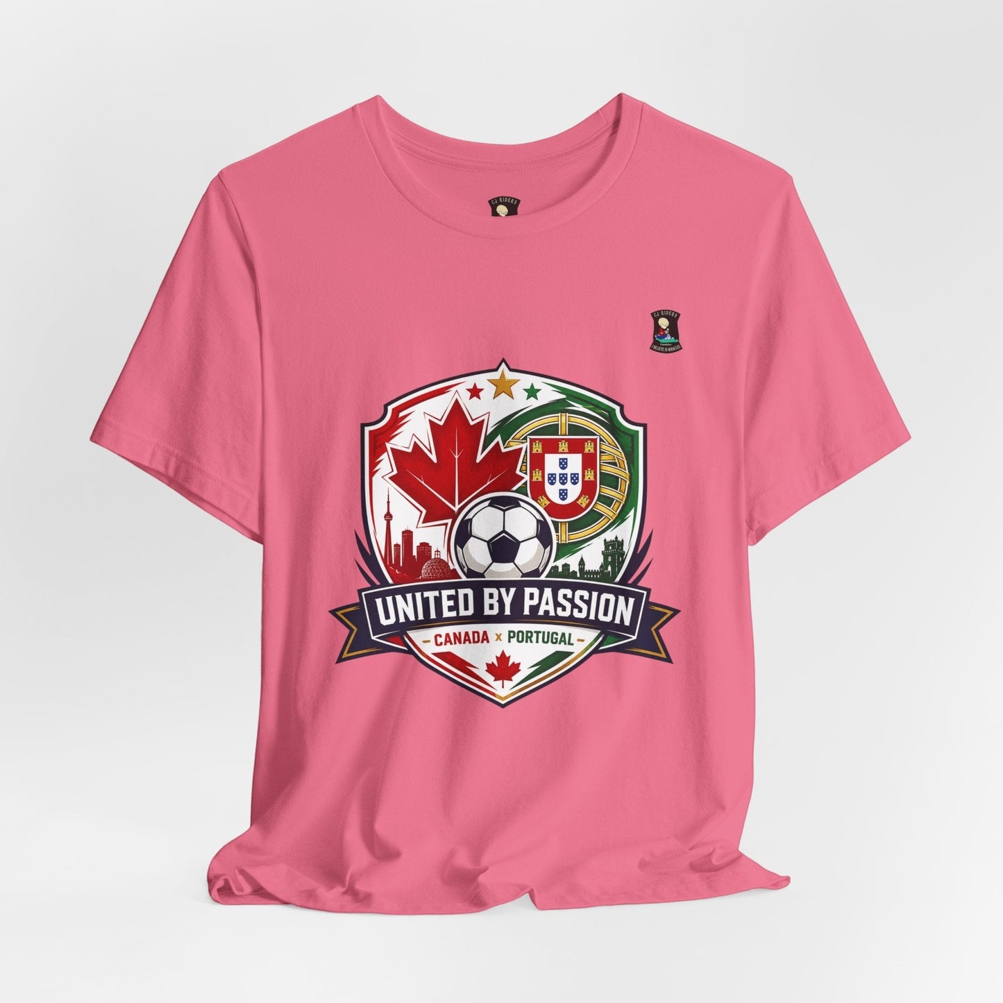 CJ Riders Foundation Store pink 100% cotton t-shirt with Canada & Portugal soccer crest and "United by Passion" graphic.