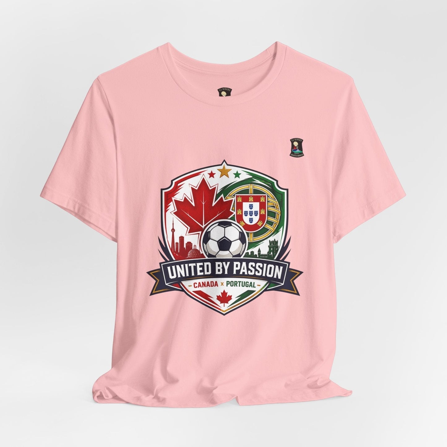 CJ Riders Foundation Store pink 100% cotton t-shirt with Canada & Portugal United by Passion 2026 soccer graphic.