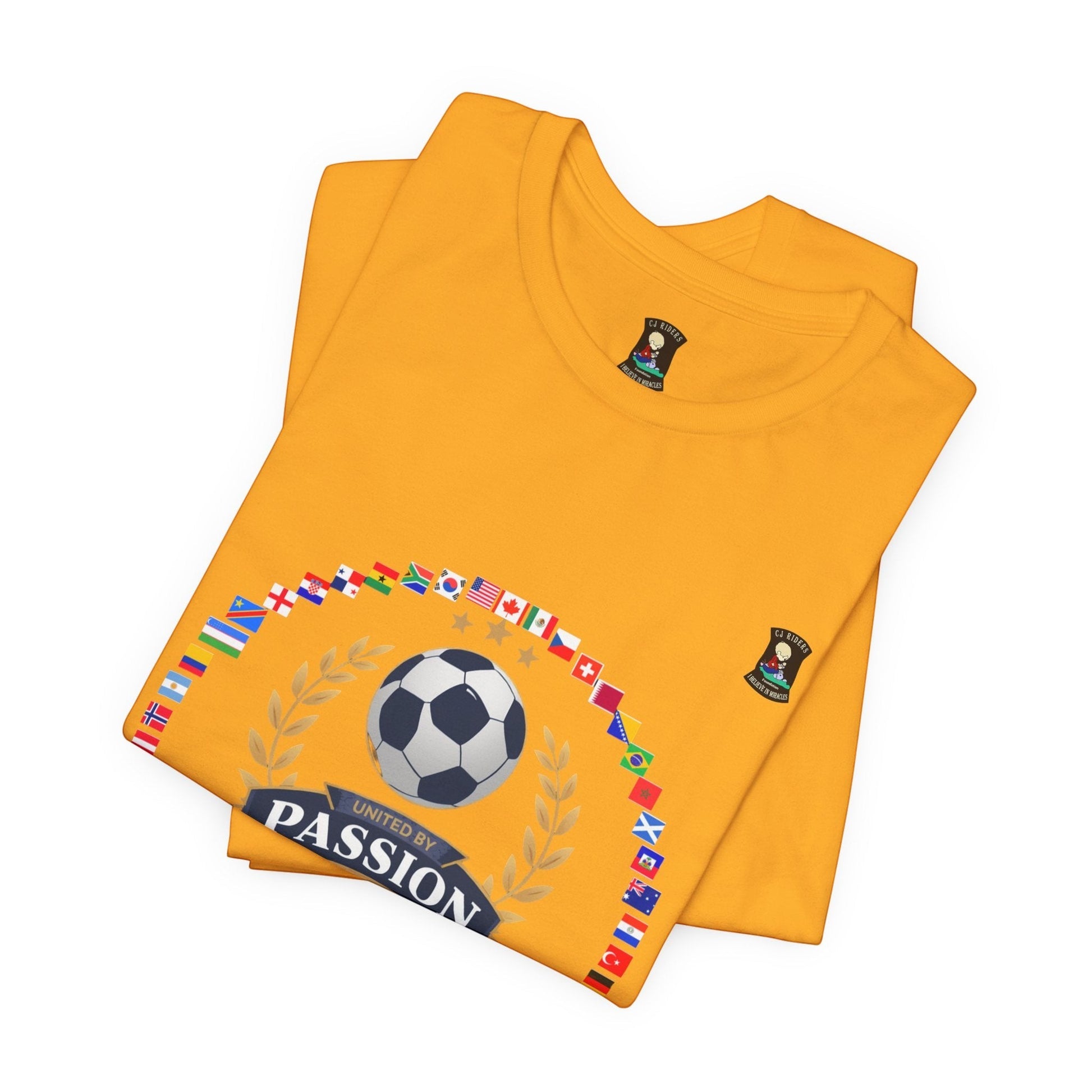 CJ Riders Foundation Store orange 100% cotton t-shirt with soccer ball, flags, and "United by Passion" text.