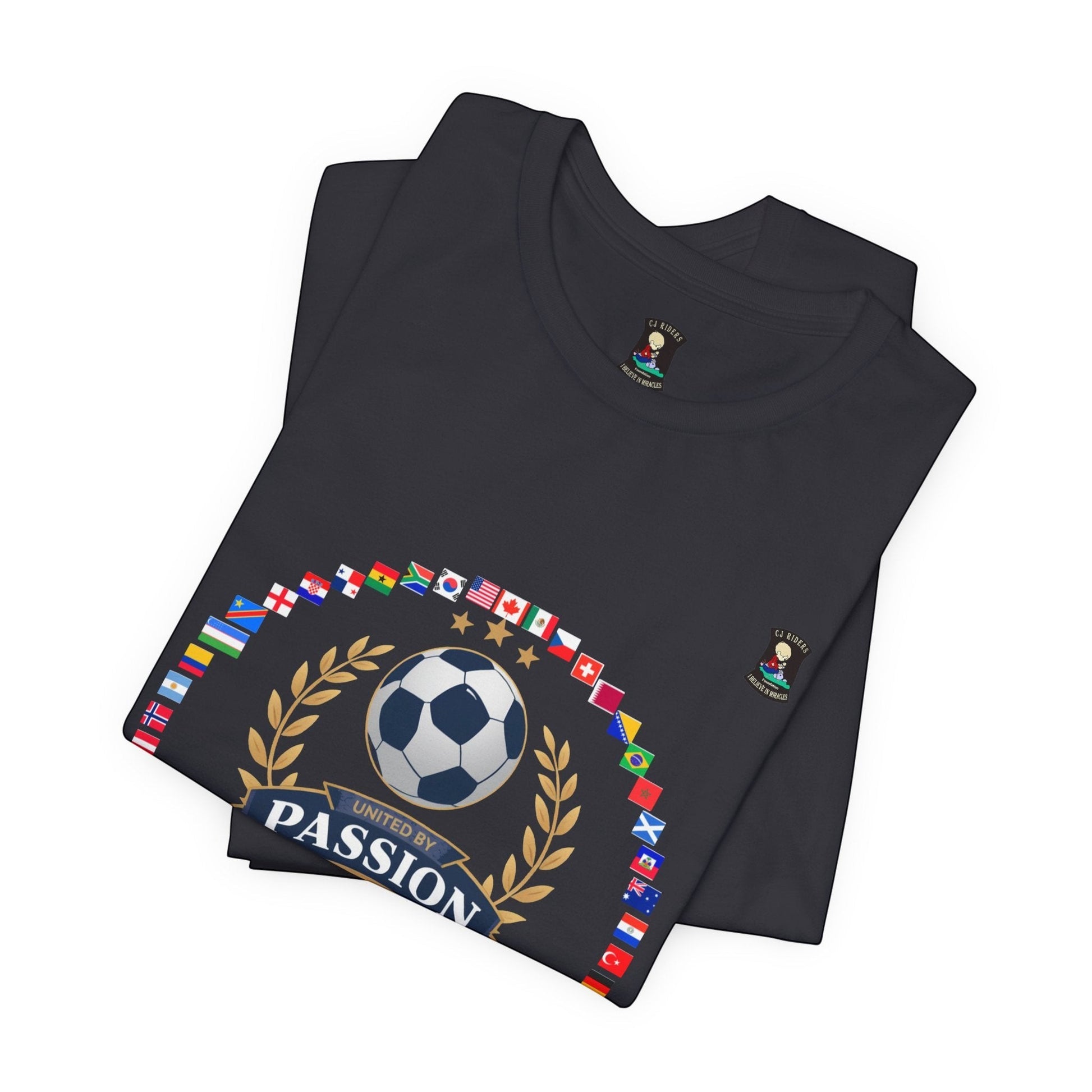 CJ Riders Foundation Store dark grey 100% cotton t-shirt with soccer graphic featuring flags, a soccer ball, and "United by Passion" text.