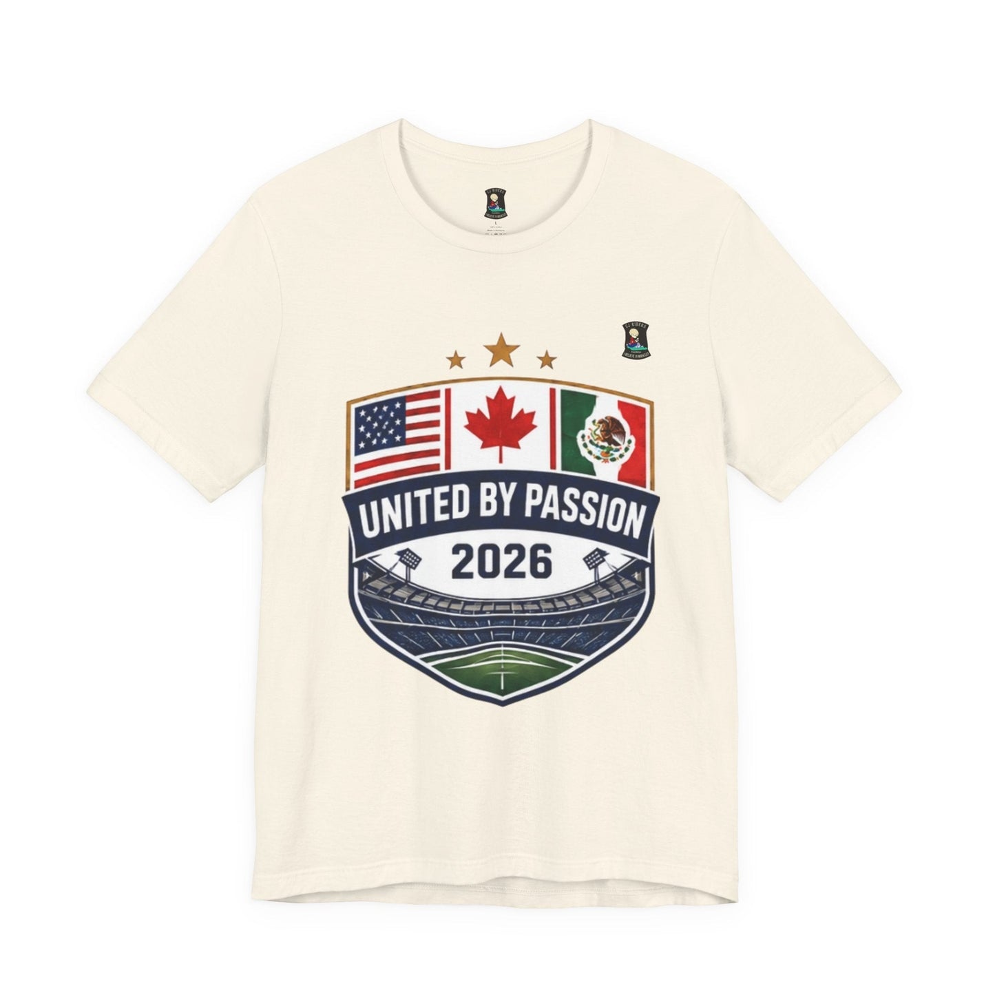 CJ Riders Foundation Store cream 100% cotton t-shirt with shield design featuring USA, Canada, Mexico flags and "United by Passion 2026" text.
