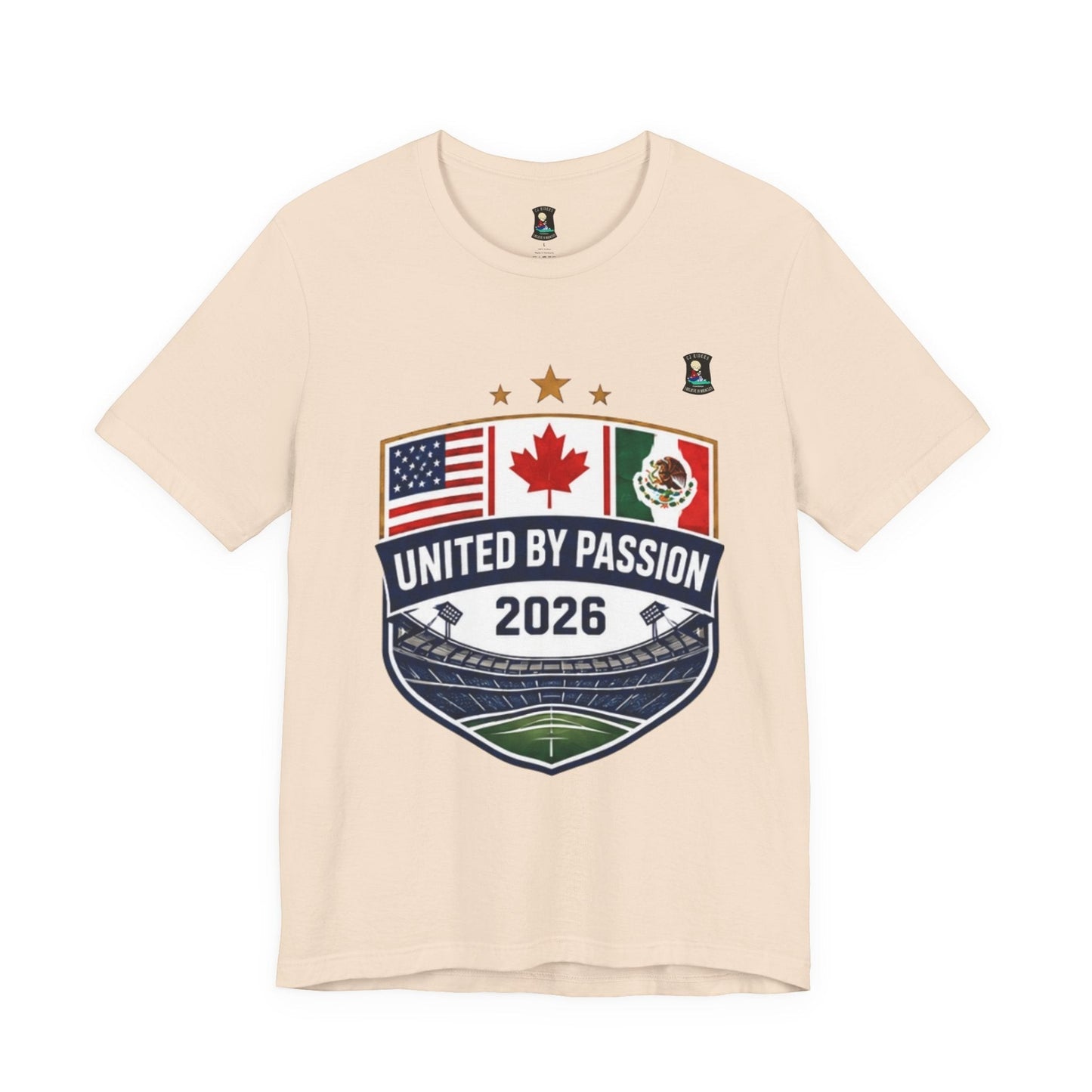 CJ Riders Foundation Store cream 100% cotton t-shirt with shield design featuring USA, Canada, Mexico flags and "United by Passion 2026" text.
