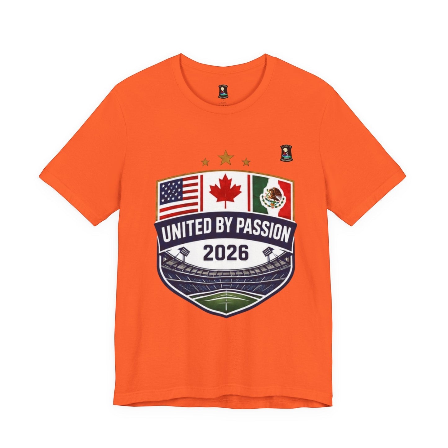 CJ Riders Foundation Store orange 100% cotton t-shirt with United by Passion 2026 shield graphic featuring USA, Canada, Mexico flags and stadium.