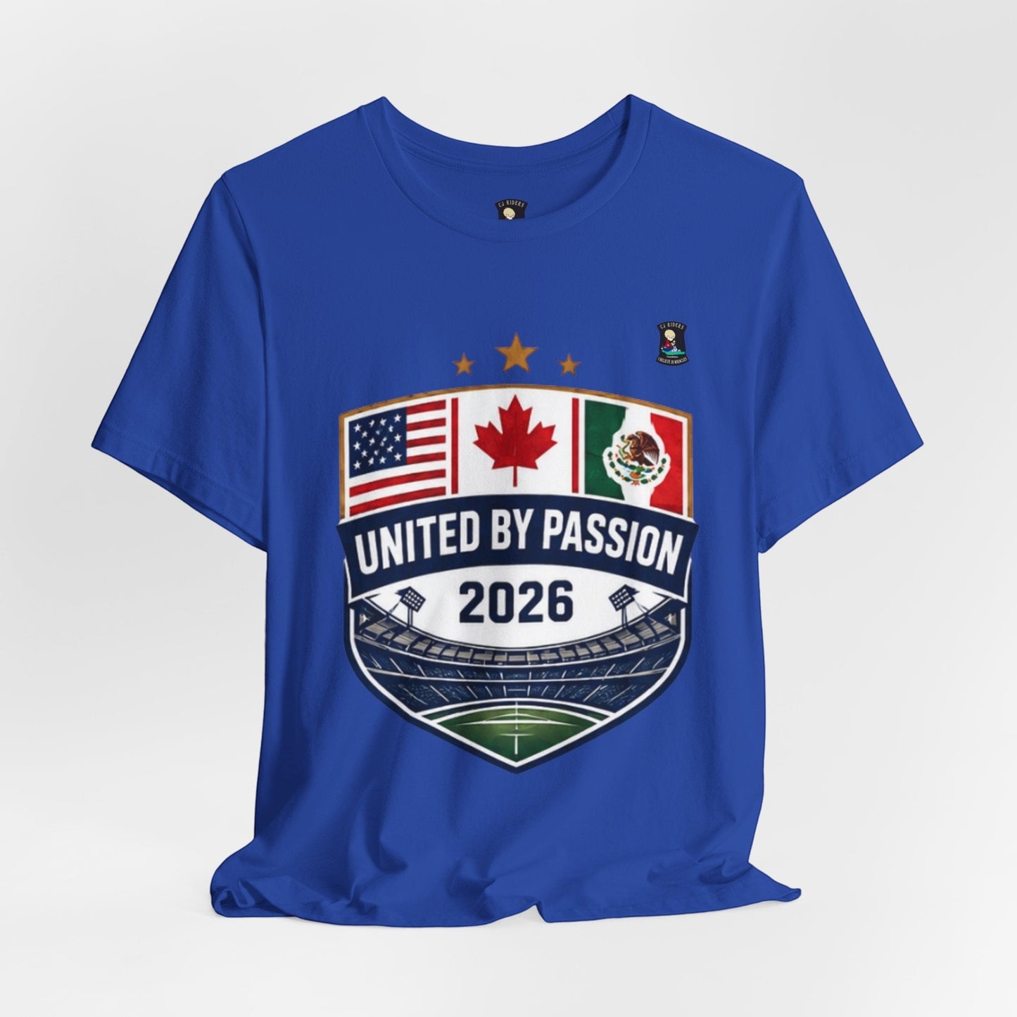 CJ Riders Foundation Store blue 100% cotton t-shirt with United by Passion 2026 shield design featuring US, Canadian, and Mexican flags.