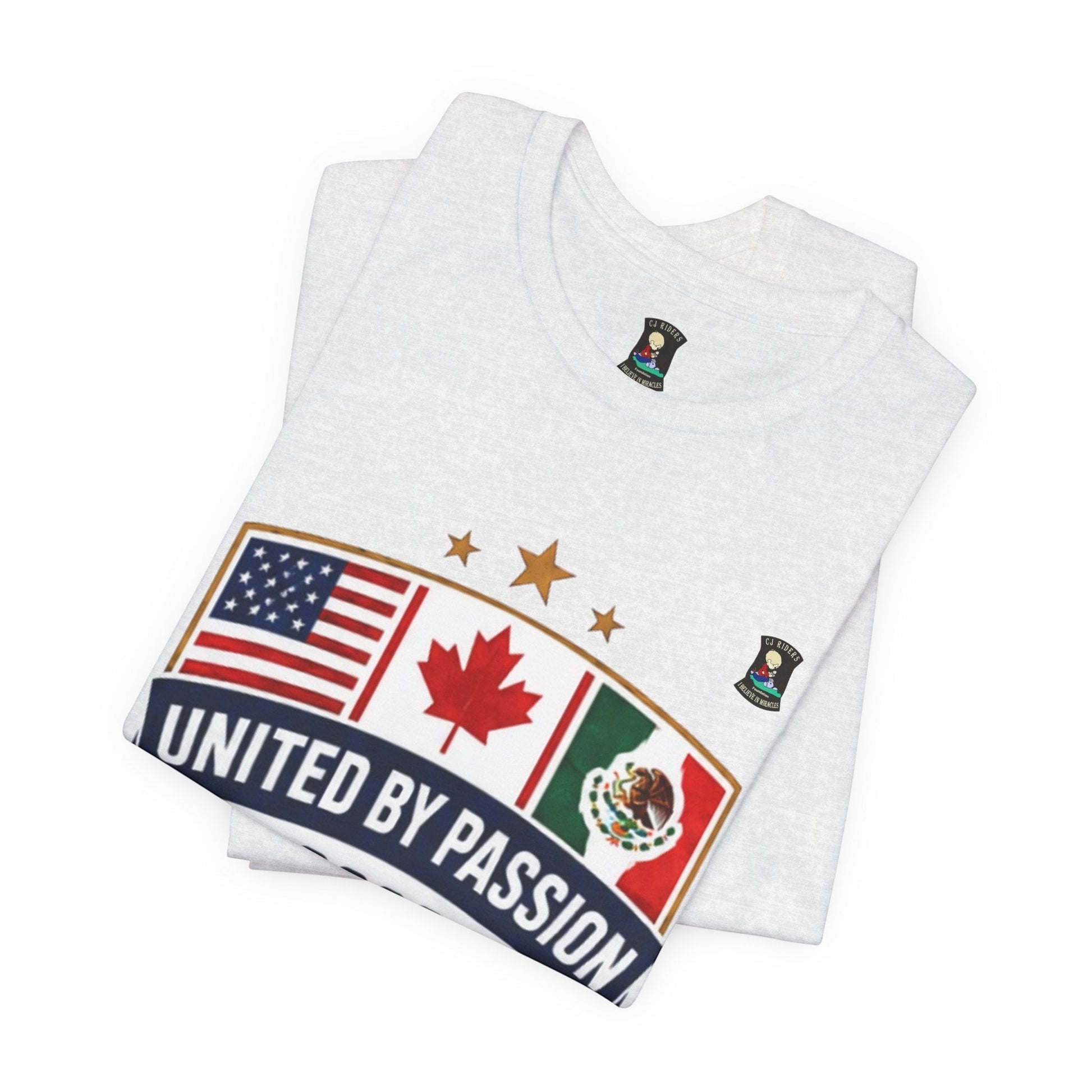 CJ Riders Foundation Store white 100% cotton t-shirt with United by Passion 2026 shield design featuring USA, Canada, and Mexico flags.