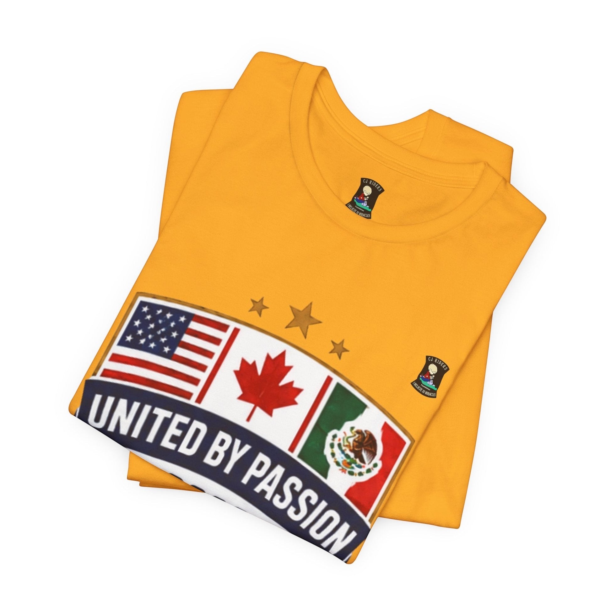 CJ Riders Foundation Store yellow 100% cotton t-shirt with USA, Canada, Mexico flags and "United by Passion" text.