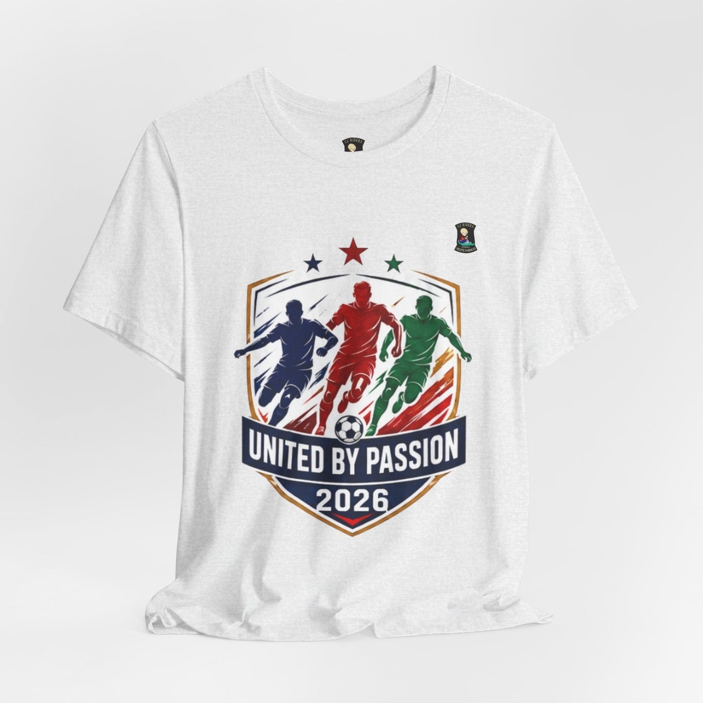 CJ Riders Foundation Store white 100% cotton t-shirt with "United by Passion 2026" graphic featuring 3 soccer players and a ball.