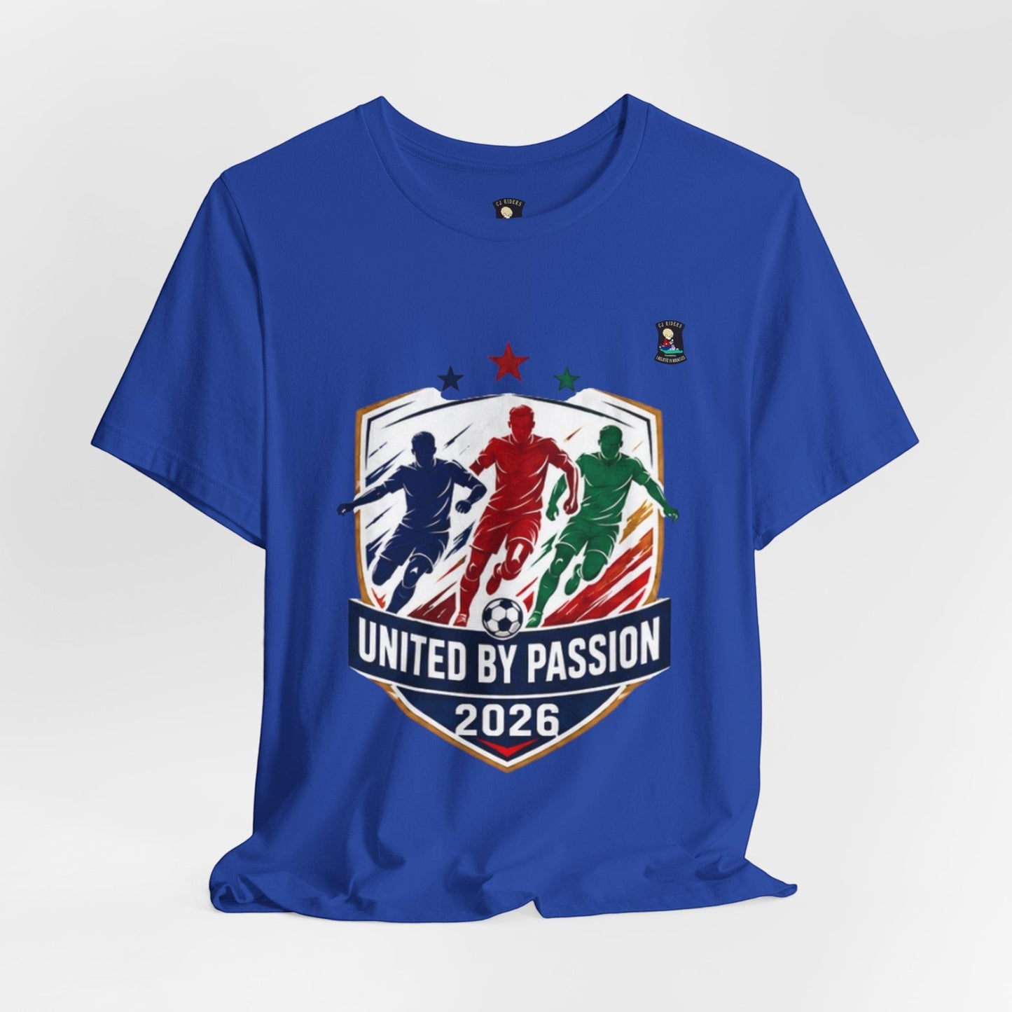 CJ Riders Foundation Store blue cotton t-shirt with "United by Passion 2026" graphic featuring 3 soccer players and a ball.