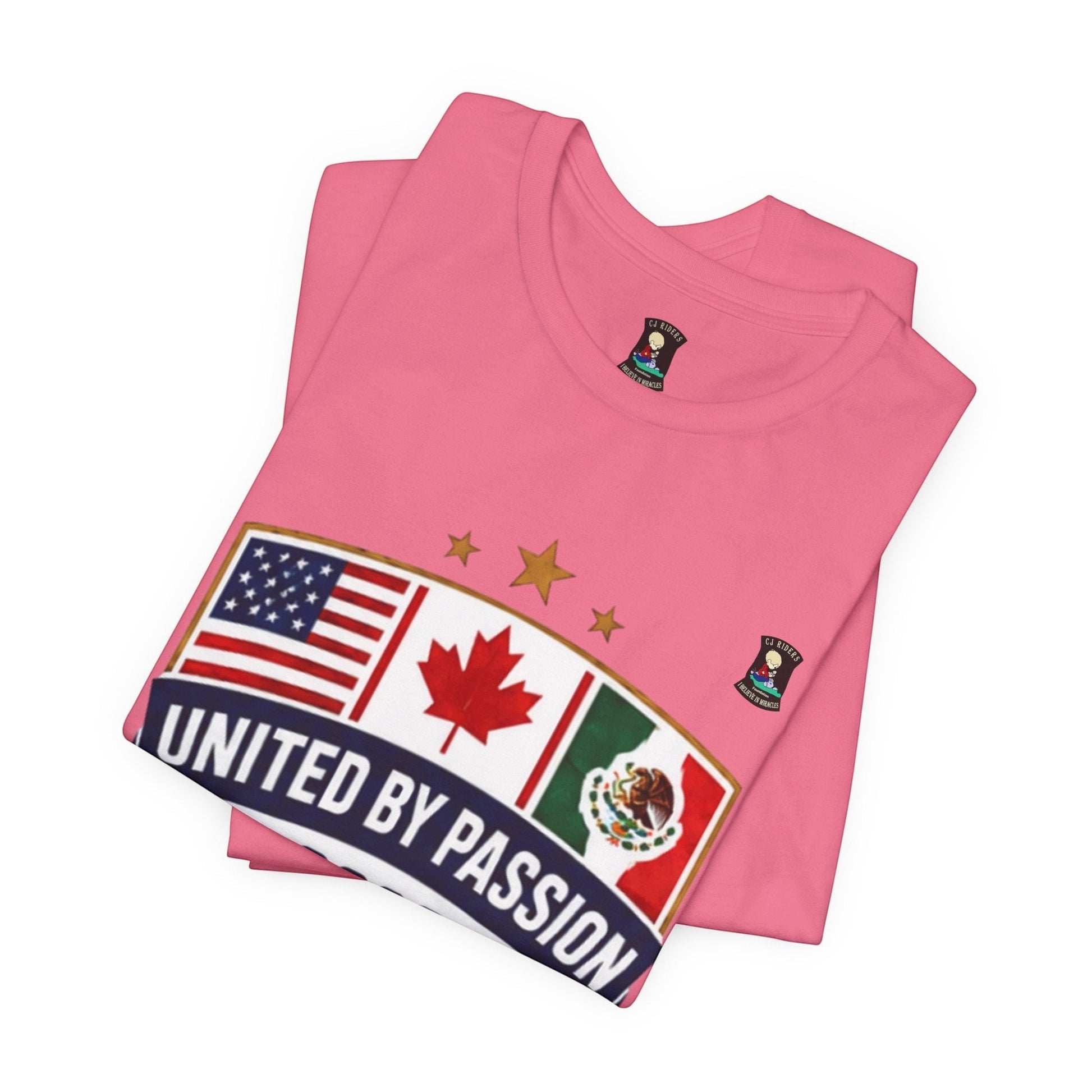 CJ Riders Foundation Store pink 100% cotton t-shirt with USA, Canada, Mexico flags and "United by Passion" text.