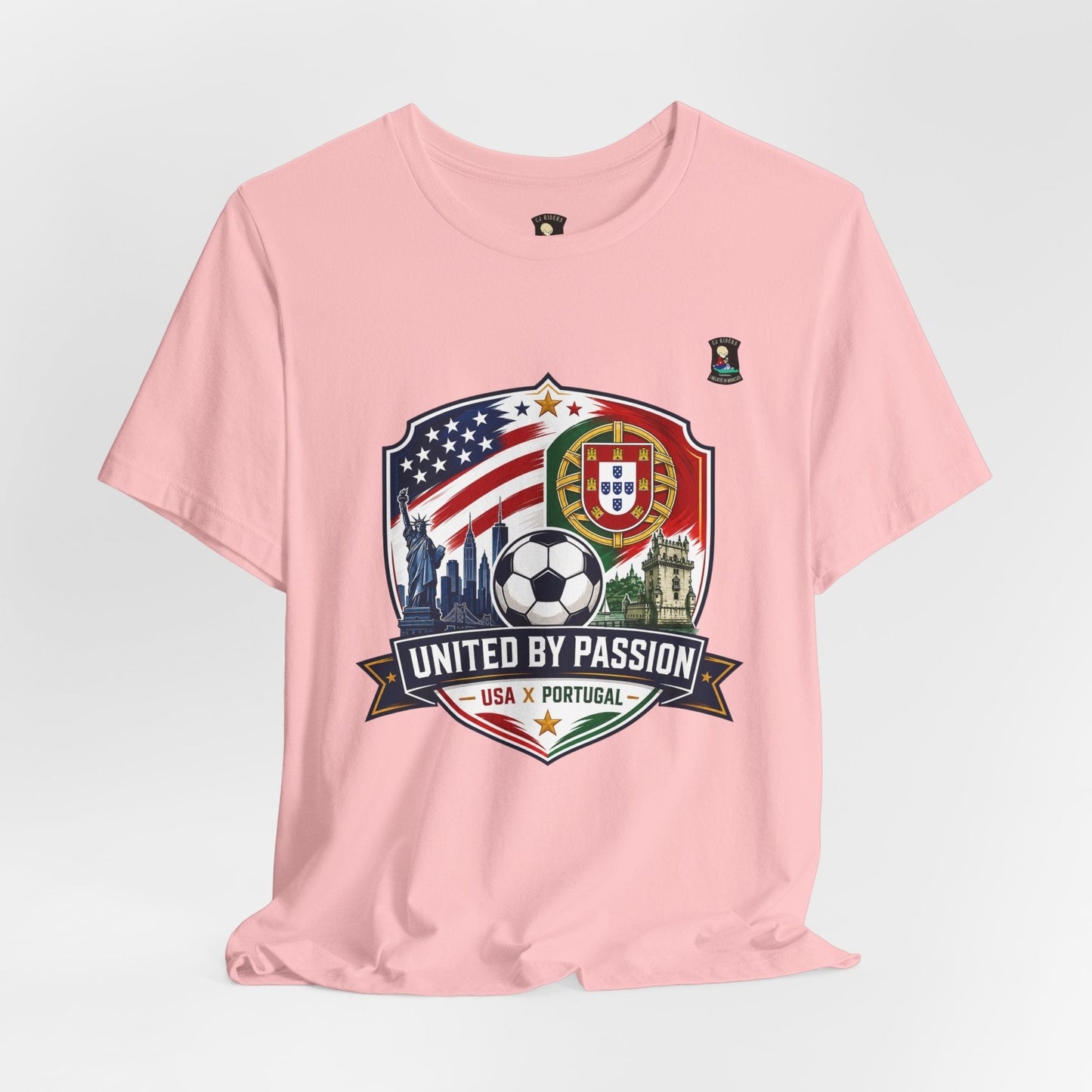 CJ Riders Foundation Store pink cotton t-shirt with USA & Portugal soccer graphic and "United by Passion" text.