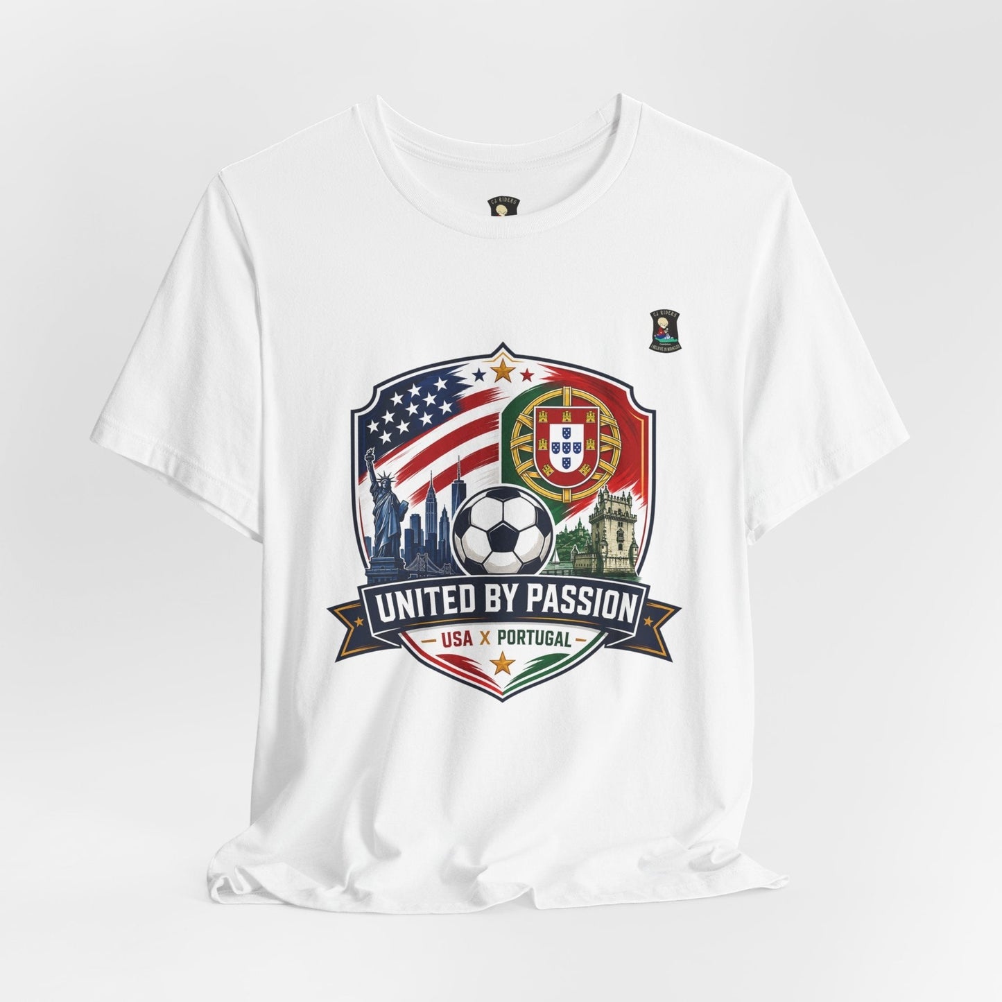 CJ Riders Foundation Store white 100% cotton t-shirt with USA & Portugal soccer badge, Statue of Liberty, and skyline graphic.