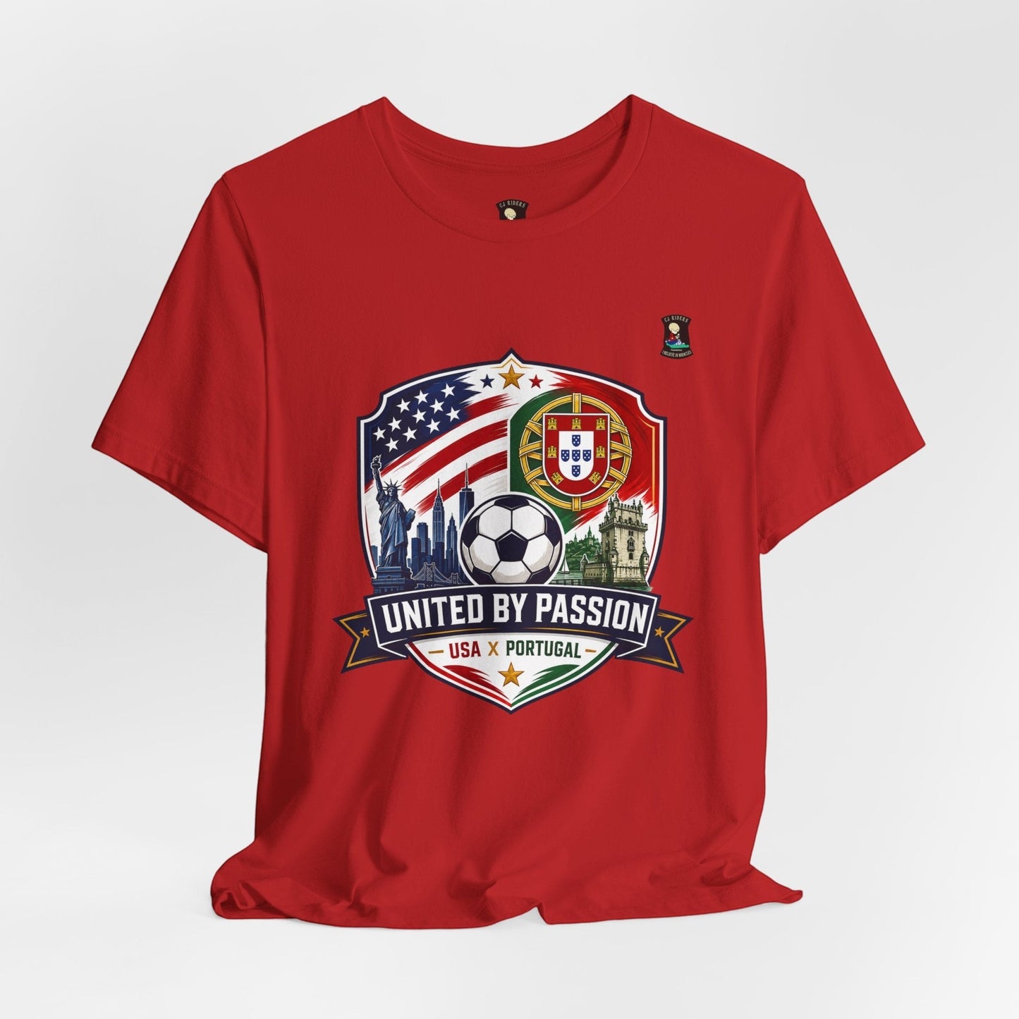 CJ Riders Foundation Store red 100% cotton soccer t-shirt with USA & Portugal United by Passion 2026 graphic.